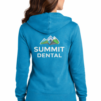 Custom Women’s Full Zip Hoodie with Back Vinyl Graphic Design Custom women’s full zip hoodie with large vinyl graphic logo on back for branded apparel and promotional wear